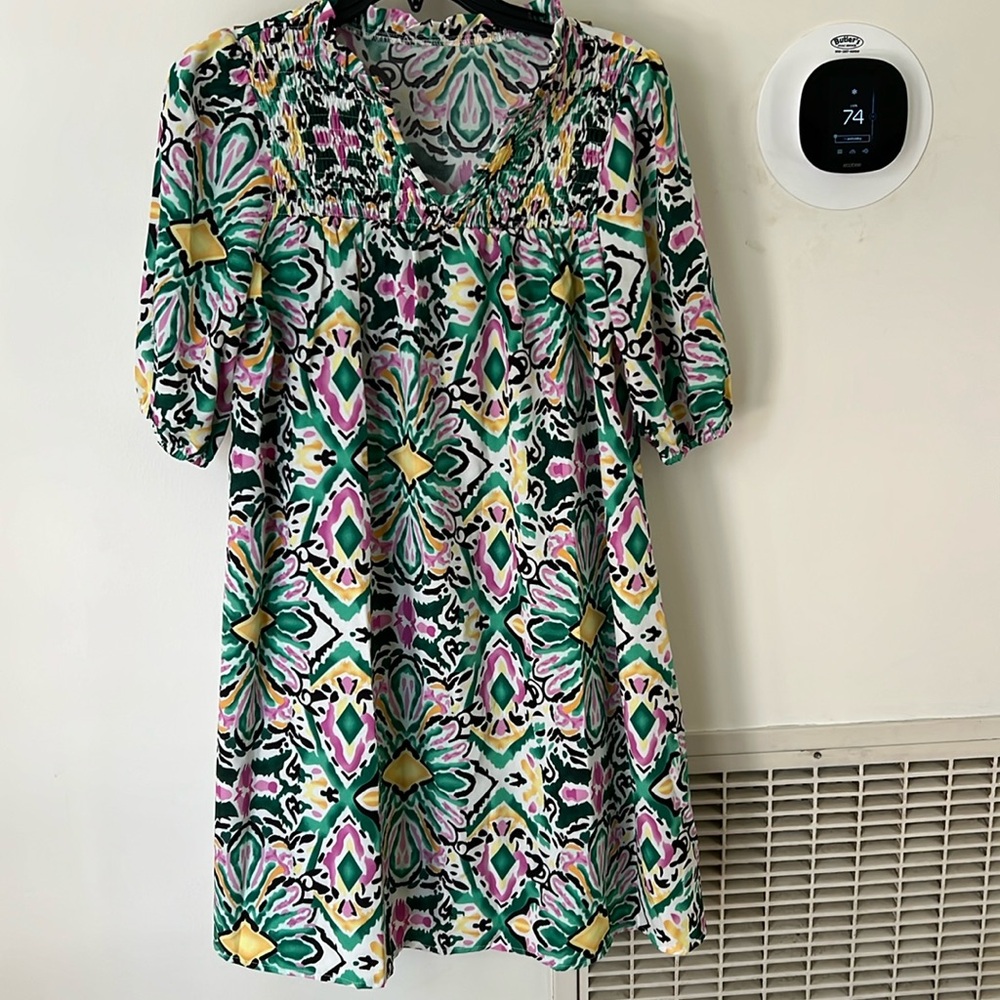 Fun, festival and casual.size small multi colored dress